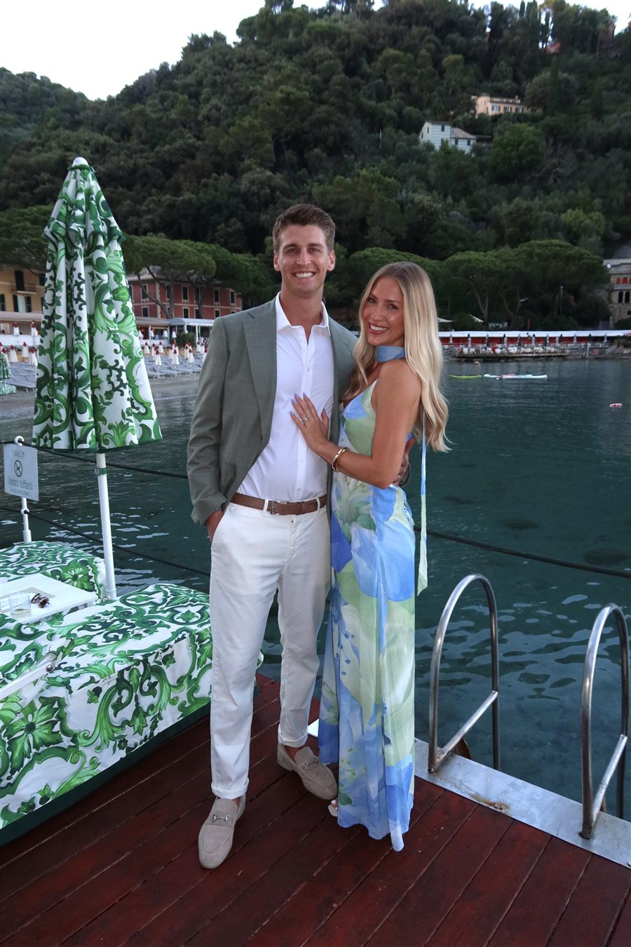 Cory Thurston and his wife, Shelby, standing on a dock by the water